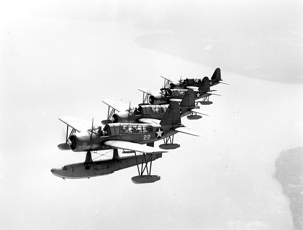  A OS2U Kingfisher fly in echelon formation over NAS Jacksonville in 1943. 